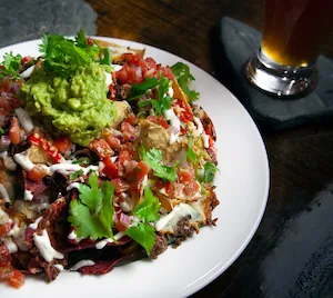 A well prepared plate of nachos for you to savour